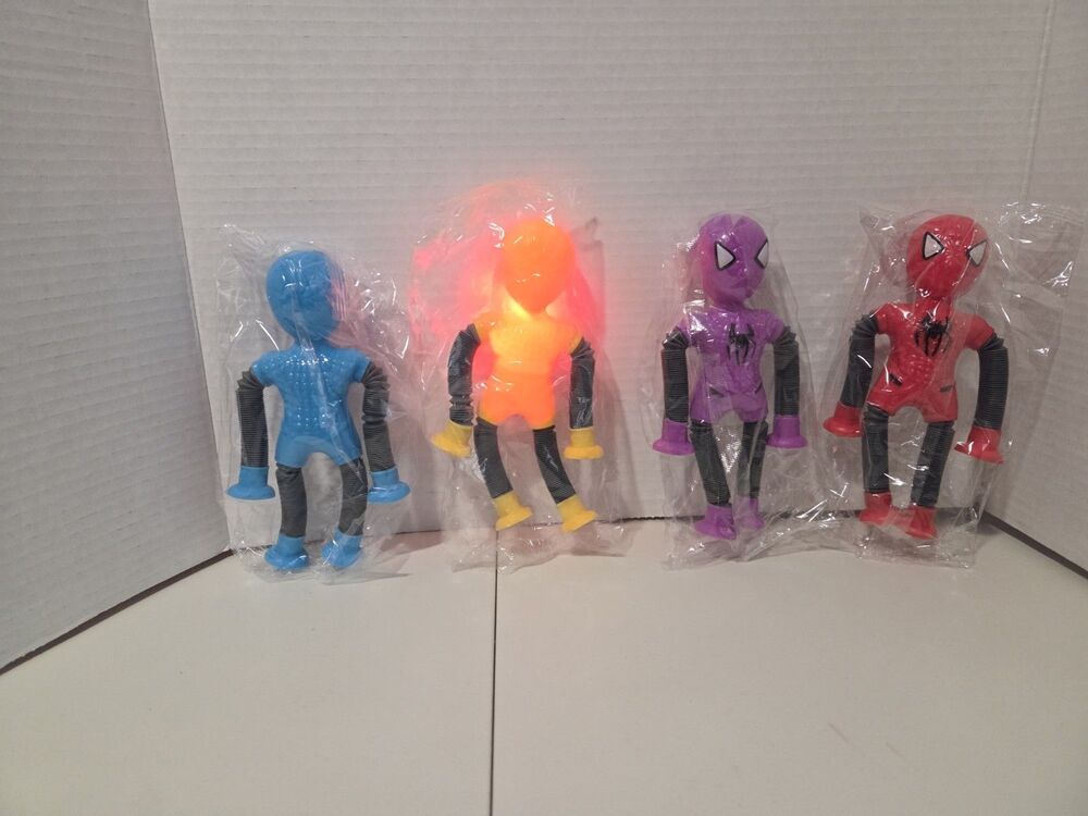 Lot of 11 Action  Figures that  light up and the arms and legs stretch